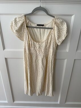 Brandy Melville pale yellow mini floral dress NWOT